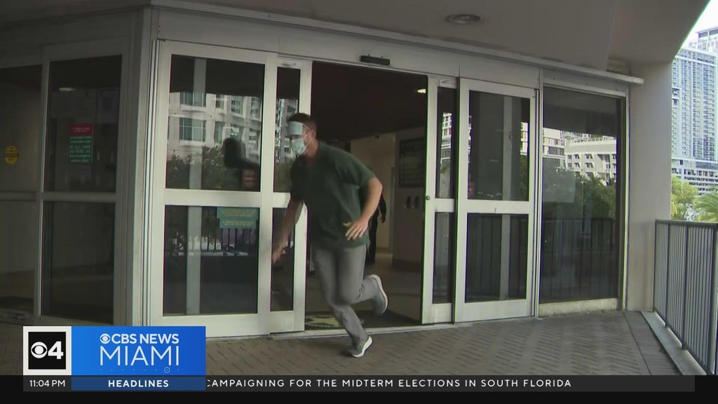 Ex-Lauderhill cop arrested for impersonating dead man runs away from cameras after release — CBS Miami, Delray Beach Community news
